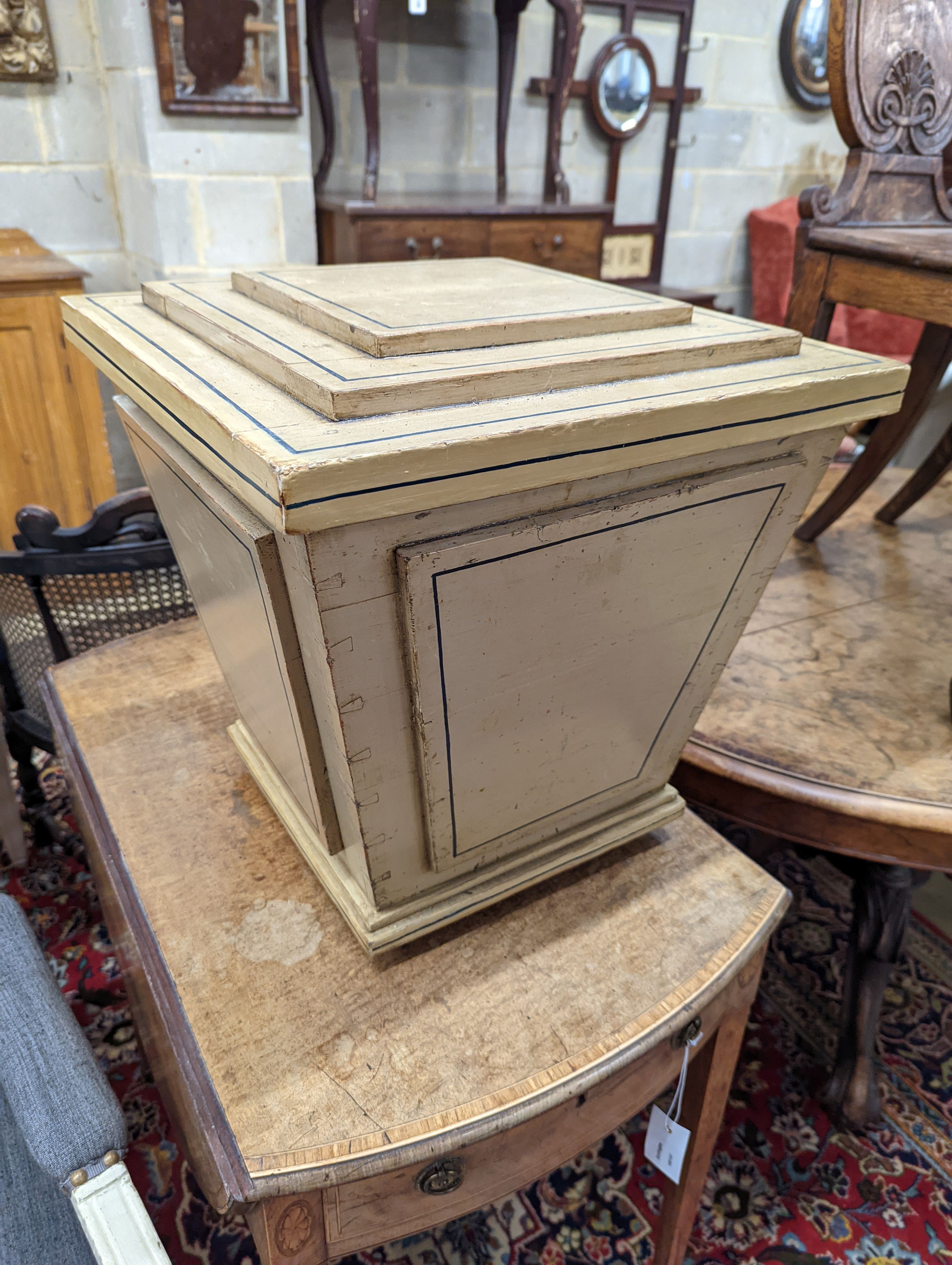 A painted pine sarcophagus shaped coal box with stepped cover, width 43cm, depth 43cm, height 44cm